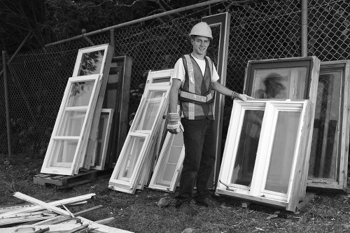 Professional office clearance team removing furniture