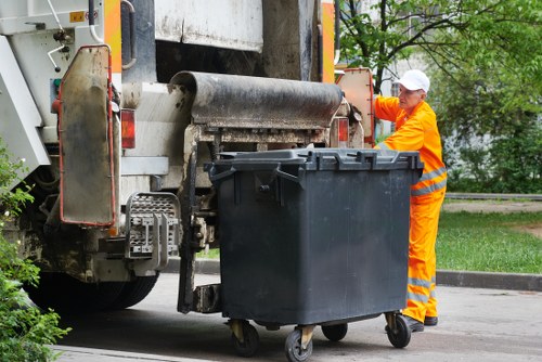 Team clearing construction debris on a South East London site