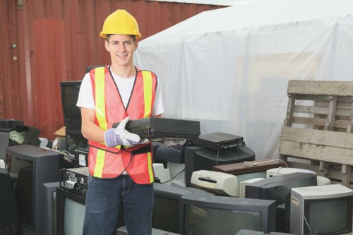 Bulky waste items being collected from a property